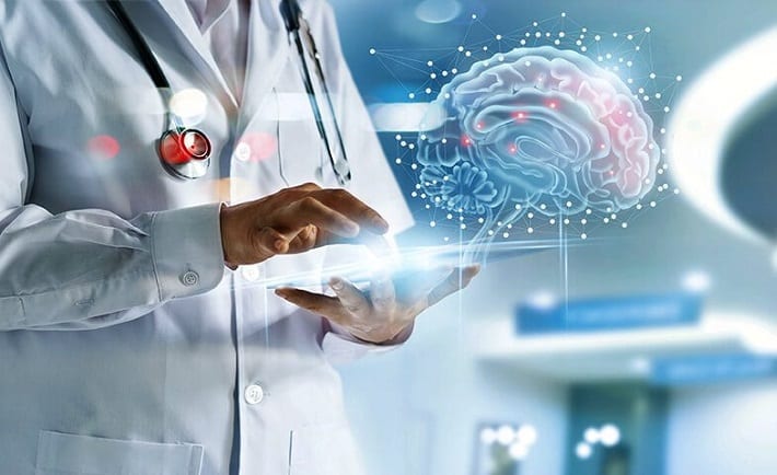 This is an image of a health care professional using an AI system in clinical practice. This Photo by Unknown Author is licensed under CC BY